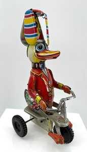 lot 38 image: Vintage Blic Tin Toy Duck on Tricycle, Made in China