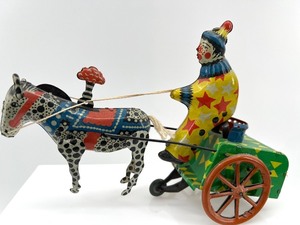 lot 40 image: Vintage USSR Tin Wind-Up Toy with Clown and Horse
