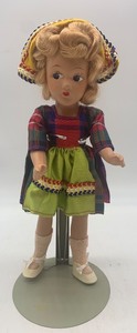 lot 68 image: Vintage Doll in Plaid Dress with Headscarf