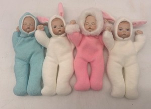 lot 74 image: Collection of 4 Ann Gette Soft Baby Dolls in Bunny Costumes