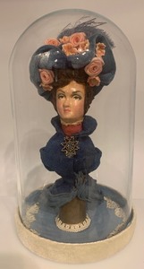 lot 76 image: Antique Lady Bust Doll in Glass Dome with Floral Hat