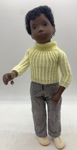 lot 85 image: Vintage Sasha Doll with Yellow Sweater and Houndstooth Pants