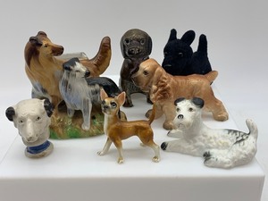 lot 101 image: Set of 8 Ceramic Dog Figurines