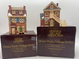 lot 124 image: Set of 2 Disney Parks Village Series Porcelain Buildings
