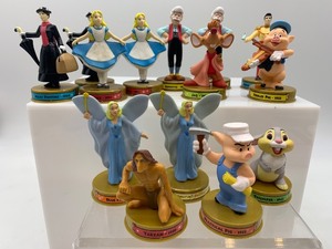 lot 138 image: Set of 12 Disney Character Figurines - Mary Poppins, Alice, Tarzan, and More