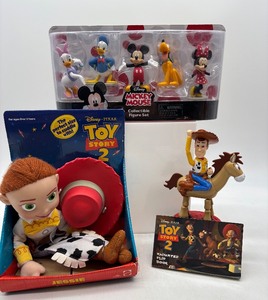 lot 144 image: Disney Toy Story 2 and Mickey Mouse Collectible Figure Sets