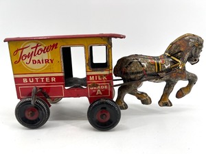 lot 153 image: Vintage Toytown Dairy Tin Toy Horse and Wagon
