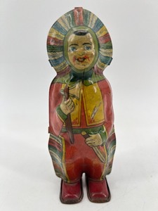 lot 175 image: Vintage J. Chein Wind-Up Tin Indian Chief Toy