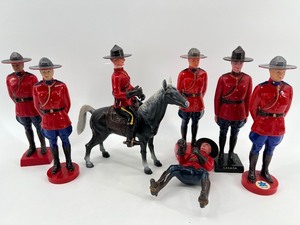 lot 177 image: Collection of Royal Canadian Mounted Police Figurines and Horse