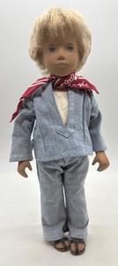 lot 220 image: Vintage Sasha Doll with Blue Denim Outfit and Red Bandana