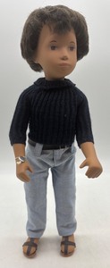 lot 222 image: Vintage Sasha Doll with Black Sweater and Blue Jeans
