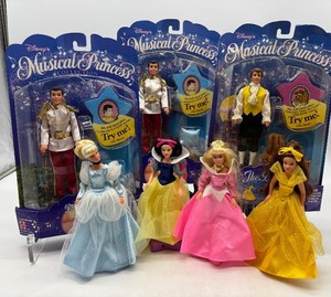lot 228 image: Disneys Musical Princess Collection 3 Musical Princes and 4 Princess Dolls