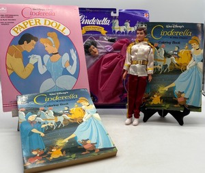 lot 230 image: Disneys Cinderella Prince Doll, Wicked Stepmother Costume, and 2 Coloring Books Set