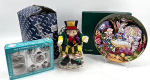 lot 288 image: Alice in Wonderland Collectibles Mad Hatter Figurine, Fitz and Floyd Plate, and Tea Set