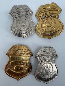 lot 290 image: Set of 4 Vintage Junior Fire Dept. Badges