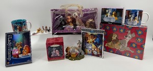 lot 294 image: Disney Lady and the Tramp Collectible Set with DVDs, Mugs, Stationary and Figurines