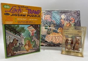 lot 295 image: Vintage Disney Lady and the Tramp Jigsaw Puzzle, Puzzle Wrapped in Plastic and Salt & Pepper Shakers