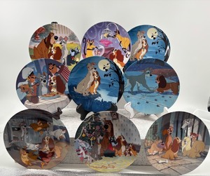 lot 297 image: Set of 9 Disney Lady and the Tramp Collectible Plates with Some Certificates