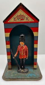 lot 304 image: Vintage Tin Toy Soldier Money Box