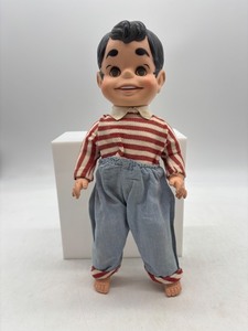 lot 362 image: Vintage Mid-Century Big Boy Plastic Doll with Striped Outfit