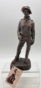 lot 384 image: Michael Garman Cowboy Sculpture Signed and Dated 1989