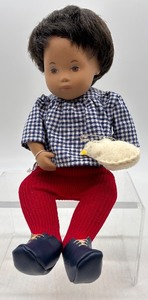 lot 385 image: Vintage Sasha Baby Collectible Doll with Red Tights and Gingham Top
