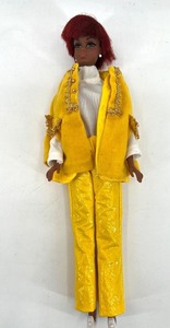 lot 407 image: Vintage Barbie Doll with Red Hair and Yellow Outfit