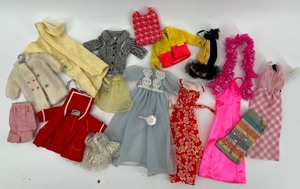 lot 409 image: Vintage Barbie Doll Clothing Set with Dresses, Blouses, and Accessories