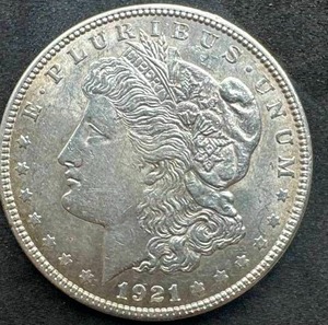 lot 7 image: 1921 Silver Morgan Dollar (high grade AU or better)