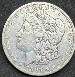 lot 54 image: 1897-O Morgan Silver Dollar
