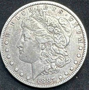 lot 64 image: 1887-O Morgan Silver Dollar VF (better date)
