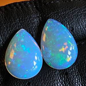 lot 7 image: LARGE 19.76 Carat Natural Welo Opal Pair, Teardrop Shape Retail Value Approximately $4,940 VIDEO