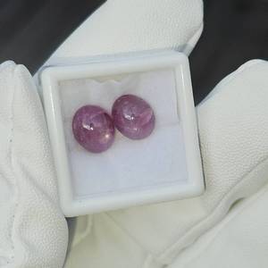 lot 22 image: 10.9 Carat Natural Star Ruby Pair, Cabochon Cut VIDEO