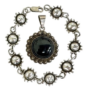 lot 12J image: Vintage Sun Figurine Sterling Silver Bracelet and Sterling Silver and Onyx Pendant