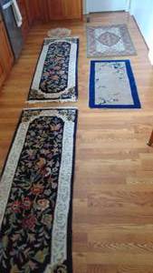 lot 9 image: 4- Rugs and 1 Rd Chair Pad