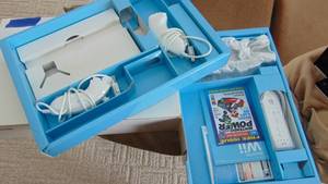 lot 28 image: 2-Wii Nunchucks and 1- Wii Remote. No Console