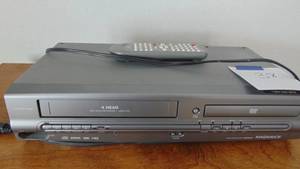 lot 38 image: Magnavox 4 Head VCRDVD Player with Remote MWD2205