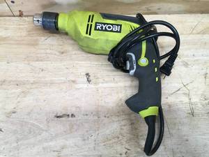 lot 25 image: RYOBI 6.2 Amp Corded 58 in. Variable Speed Hammer Drill Model # D620H