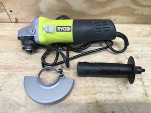 lot 26 image: RYOBI 5.5 Amp Corded 4-12 in. Angle Grinder Model # AG4031G