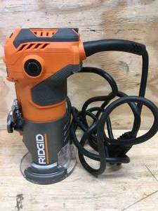 lot 32 image: RIDGID 5.5 Amp Compact Fixed-Base Corded Router Model # R24012