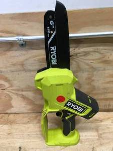 lot 38 image: RYOBI ONE 18V 6 in. Cordless Battery Compact Pruning Mini Chainsaw Model # PCLCW01 - Tool Only