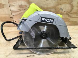 lot 39 image: RYOBI 13 Amp Corded 7-14 in. Circular Saw Model # CSB125