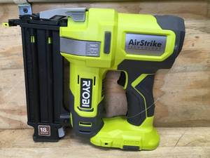 lot 40 image: RYOBI ONE 18V 18-Gauge Cordless AirStrike Brad Nailer Model # P321 - Tool Only