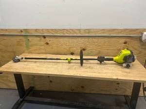 lot 91 image: RYOBI Full Crank 25cc Gas Powered String Trimmer