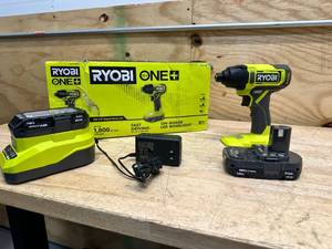 lot 144 image: RYOBI  ONE 18V Cordless 14 in. Impact DrillDriver Kit with (2) 1.5 Ah Batteries and Charger