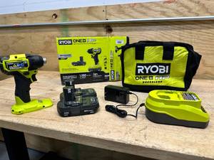 lot 147 image: RYOBI ONE HP 18V Brushless Cordless Compact 14 in. Hex Impact Driver Kit with (2) 1.5 Ah Batteries and Charger