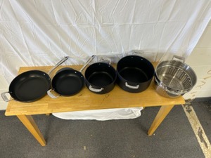 lot 28 image: All Clad Set of multi piece set, Pots and Pans