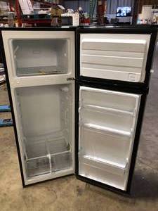 lot 8 image: Vissani 7.1 cu. ft. Top Freezer Refrigerator in Stainless Steel Look Damaged on Top Corner    Customer Returns See Pictures