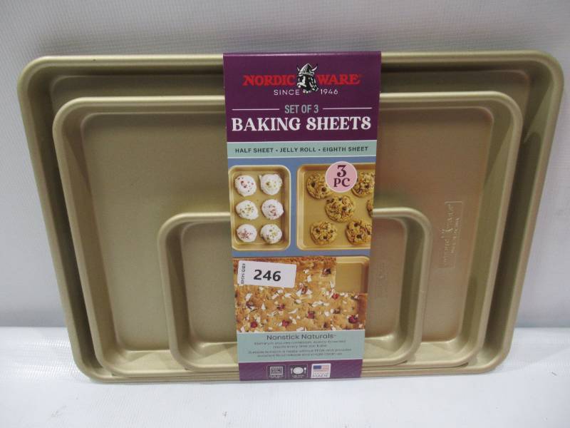 lot 333 image: NEW Nordic Ware 3-Piece Nonstick Baking Sheet Set, Half Sheet, Jelly Roll, & Eighth Sheet - Gold