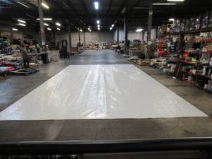 lot 208 image: NEW Vinyl Tarp - 16.33 x 30  Black  White Vinyl tarp - 9 oz. Lightweight Duty